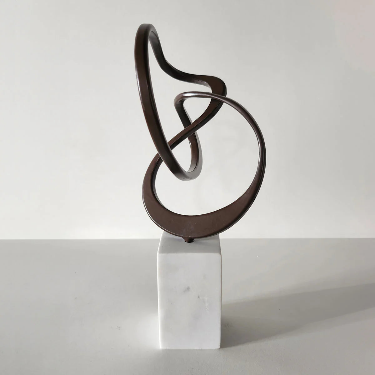 Brown metal abstract sculpture by FP Art